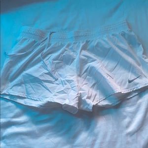 white nike shorts